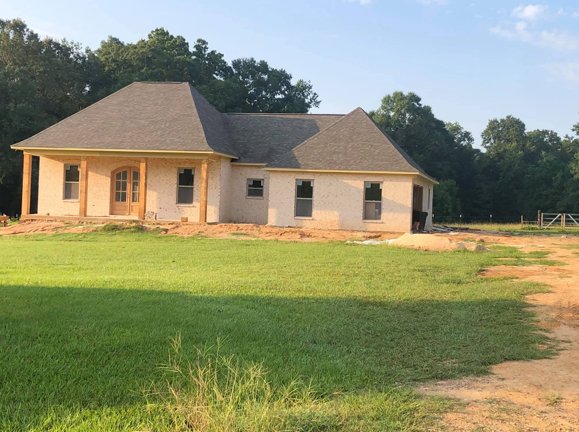 New construction brick home by J.V. Construction